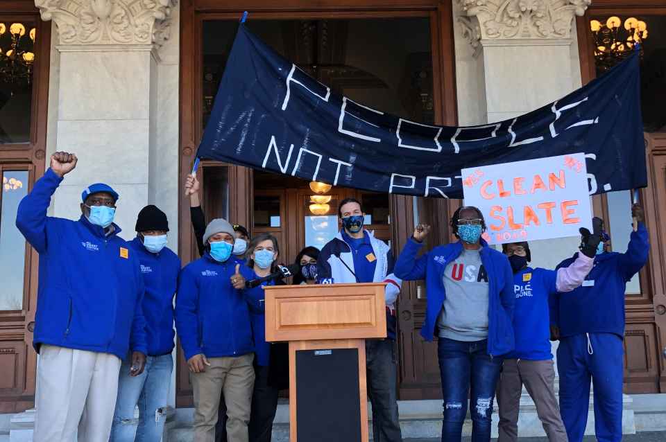 Image of a community rally in support of voting rights